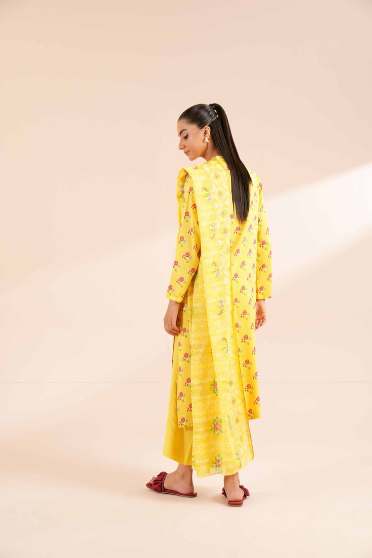 Brand: NishatCollection: Nishat Fall Fantasy Unstitched Summer CollectionFabric: Lawn Product Detail:Cross Stitch Printed Style Shirt with Dupatta and Trousers SHIRTPrinted Lawn Shirt: 3 MeterFabric: LawnColor: Yellow DUPATTAPrinted Doriya Dupatta: 2.5 MeterFabric: DoriyaColor: Yellow TROUSERSSolid Cambric Trousers: 2.5 MeterFabric: CambricColor: Yellow DISCLAIMER:* Lining, Laces, and Tassels are not included in unstitched variants.* Embellishment items in stitched outfits are subject to market availability.* The actual colors of the outfit may vary from the colors being displayed on your device. CARE INSTRUCTIONS: Extra Fabric Has Been Used For Shoot Original Color May Vary Slightly From The Picture Dry Clean Recommended Iron The Clothes At Moderate Temperature Do Not Use Bleach, Or Stain Yellow Silk Sets With Printed Motifs, Anarkali Sets With Long Floral Embroidery, Long Anarkali Sets With Floral Embroidery, Eid Sets With Floral Embroidery And Front Open Design, Eid Front Open Sets With Floral Embroidery, Elegant Yellow Sets With Printed Motifs, Spring Designer Wear Straight Kurta Set, Long Unstitched Suit With Resham Embroidery, Spring Sets With Sheer Dupatta And Long Sleeves