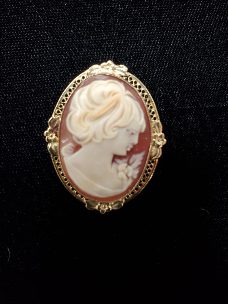 Vintage Cameo set in 14k Gold. May be worn as a brooch or a pendant. Weighs 4.3 grams. Ornate Hallmarked Brooches For Formal Occasions, Ornate Formal Brooches Hallmarked, Formal Pendant Brooch With Intricate Design, Ornate Yellow Gold Brooch For Formal Occasions, Antique Cabochon Brooch For Formal Occasions, Antique Cabochon Brooch For Formal Wear, Ornate Pendant Brooch For Formal Occasions, Antique Brooches For Formal Occasions, Classic Cameo Brooches For Wedding