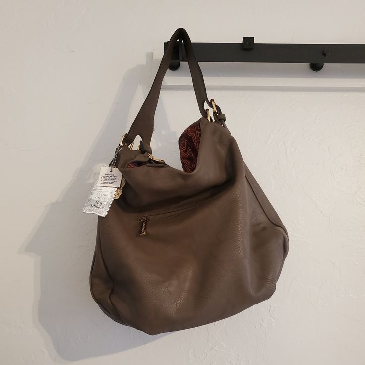 Nwt Miss Unique Handbag, Bucket/ Shoulder Style, Grayish Brown, Soft, Super Cute Spring Brown Bucket Shape Shoulder Bag, Versatile Brown Bucket-shape Shoulder Bag, Vintage Brown Bucket Bag For Shopping, Brown Leather-handled Bucket Shoulder Bag, Brown Bucket-shaped Hobo Bag, Pink Coach Purses, Crocodile Purse, Tan Purse, Embroidered Shoulder Bag