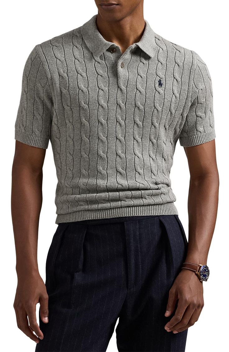 Classic cabling brings old-school details to a polo-style sweater that's knit from breathable cotton and styled to elevate any warm-weather look. 26" length (size Medium) Button half placket Spread collar Short sleeves Ribbed cuffs and hem 100% cotton Dry clean or hand wash, dry flat Imported Textured Knit Polo Collar Sweater, Fitted Cotton Polo Sweater With Ribbed Collar, Relaxed Fit Knit Polo Sweater With Polo Collar, Relaxed Fit Knit Polo Sweater, Fall Knit Polo Shirt With Ribbed Collar, Classic Wool Knitted Tops, Fitted Casual Sweater With Polo Collar, Classic Knit Polo Sweater With Polo Collar, Classic Knit Polo Collar Sweater