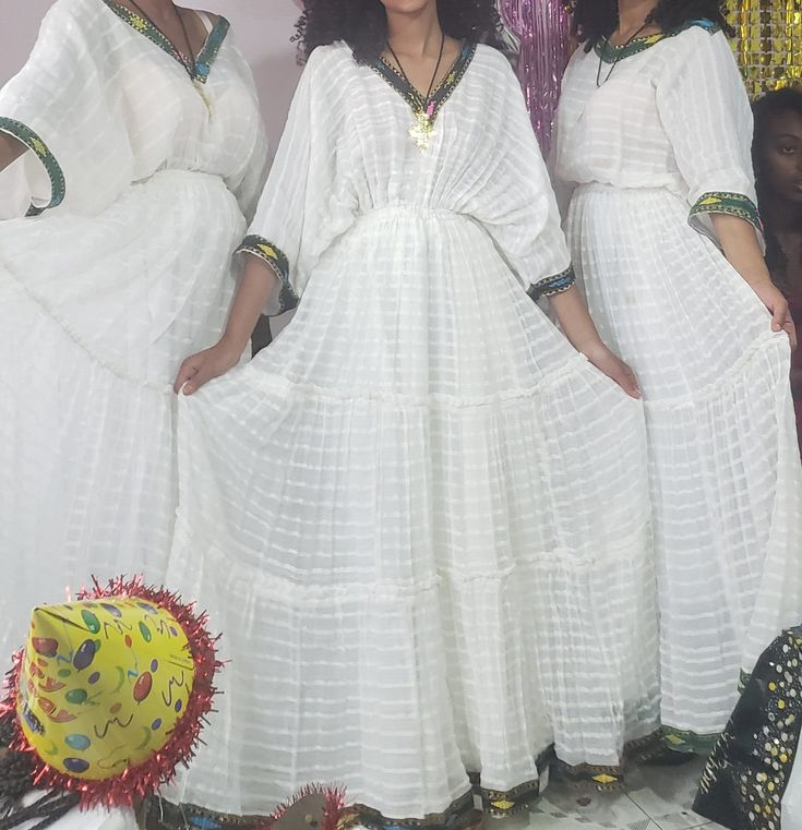 This Beautiful Ethiopian Traditional clothe is made from 100% cotton free size very comfortable it's have so much room  under the waste it gives more grace when you wore it  and it can be worn for any special program or party it is two piece with the (NETELA) all season approprate to be worne Festive Cotton Maxi Dress For Festivals, Cotton Maxi Dress For Festivals In Free Size, Festive Cotton Dress In Free Size, Free Size Cotton Maxi Dress For Festivals, White Cotton Party Maxi Dress, Cotton Dresses For Traditional Ceremonies, White Maxi Dress For Festivals, Festive Free-size Cotton Dress, Cotton Maxi Dress For Traditional Ceremonies