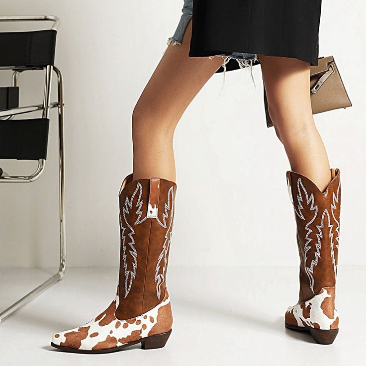 Are you ready to take your style up a notch? With the South Cow Western Boots, you can do just that! These ethical leather boots are made of vegan PU Leather and are the perfect addition to any boho outfit. Specs: Material: PU Leather Fits true to size Casual Moto Boots For Ranch In Winter, Round Toe Moto Boots For Ranch In Winter, Bohemian Knee-high Leather Boots, Brown Moto Boots For Ranch In Winter, Casual Moto Boots With Round Toe For Western-themed Events, Country Style Brown Mid-calf Boots For Fall, Western Style Boots For Spring Outdoor, Bohemian Moto Boots With Round Toe For Fall, Casual Brown Moto Boots For Rodeo