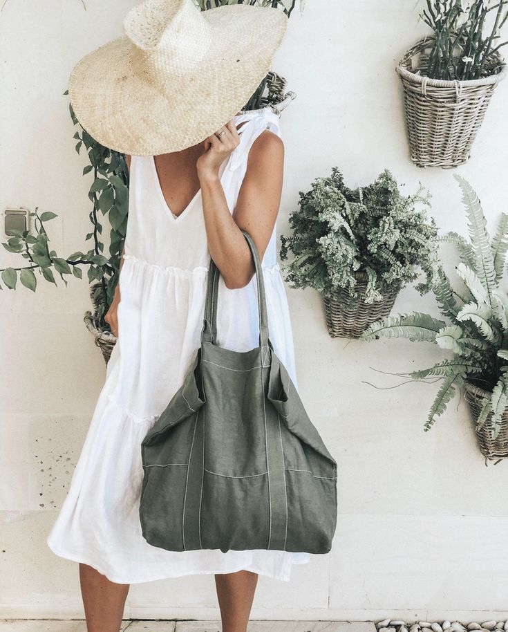 The Linen Beach Bag Features Large Linen Tote BagInside PocketWhite Contrasting StitchingLong Shoulder Straps Size Width - 55cm | Height - 43cm | Depth - 13cm Production Time As all items are made to order we require 5-7 business days for production Postage All packages are shipped with EXPRESS POST, and are delivered by DHL worldwide. Delivery is guaranteed within 1 week of shipment! @ljcdesigns White Summer Hobo Bag For Travel, Summer Green Large Capacity Hobo Bag, Summer White Hobo Bag For Travel, Summer Canvas Shoulder Bag For Beach, Summer Canvas Shoulder Bag For Vacation, Summer Linen Shoulder Bag For Everyday Use, Summer Khaki Bag With Double Handle, Summer Khaki Shoulder Bag For Everyday, Khaki Shoulder Bag For Everyday Summer Use