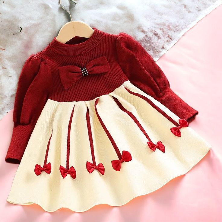 Festive Kids Christmas Dress, Toddler Xmas Outfit, Red Wool Dress for Girls, Perfect for Photoshoots & Celebrations! Get your little one ready for a magical Christmas with our charming Children's Christmas Dress. This delightful outfit is perfect for creating cherished holiday memories. Crafted with care and attention to detail, the festive red wool dress exudes elegance and warmth. Its classic design is ideal for Christmas photoshoots, family gatherings, and all the holiday festivities. Your child will look adorable and feel comfortable throughout the day. The quality of the dress ensures it can be treasured and passed down for generations. Make this Christmas unforgettable with a dress that captures the spirit of the season. Order now and let your child shine in this timeless and enchant Red Princess Dress With Bow For Dress-up, Cute Red Holiday Dress For Dress-up, Fitted Winter Dress For Dress-up Occasions, Cute Fitted Winter Dress, Long Sleeve Red Winter Dress, Cute Holiday Dress-up Dresses, Cute Holiday Dress For Dress-up, Cute Holiday Dress For Dress-up Occasions, Bow Dresses For Christmas Holiday