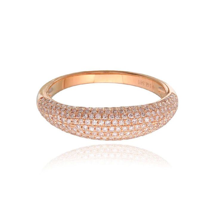 Indulge in the epitome of opulence with our 14k Gold Pavé Diamond Dome Ring, a mesmerizing masterpiece that embodies the essence of luxury and refinement. Crafted to perfection, this exquisite ring seamlessly blends timeless elegance with contemporary allure, making it a quintessential accessory for the modern sophisticate. The pièce de résistance of this ring is the breathtaking display of pavé-set diamonds adorning its surface. Each diamond, meticulously selected for its exceptional quality, creates a mesmerizing brilliance that captivates the senses and elevates any ensemble to new heights of glamour. ✪ DETAILS• Crafted with premium 14K gold, ensuring durability and a luxurious finish. • Offered in 14K Yellow, White, or Rose Gold• Genuine, conflict-free diamonds• Total Weight: 2.69g ✪ P Dazzling Cubic Zirconia Rings For Everyday Luxury, Luxury Open Diamond Ring For Everyday, Elegant Vvs Clarity Diamond Ring For Everyday Luxury, Elegant Everyday Luxury Diamond Ring With Vvs Clarity, Luxury Open Diamond Ring, Luxury Oval Dome Ring With Pave Setting, Luxury Diamond White Stackable Rings With Pave Setting, Luxury Stackable Rings With Pave Setting, Luxury Round Stackable Rings With Pave Setting