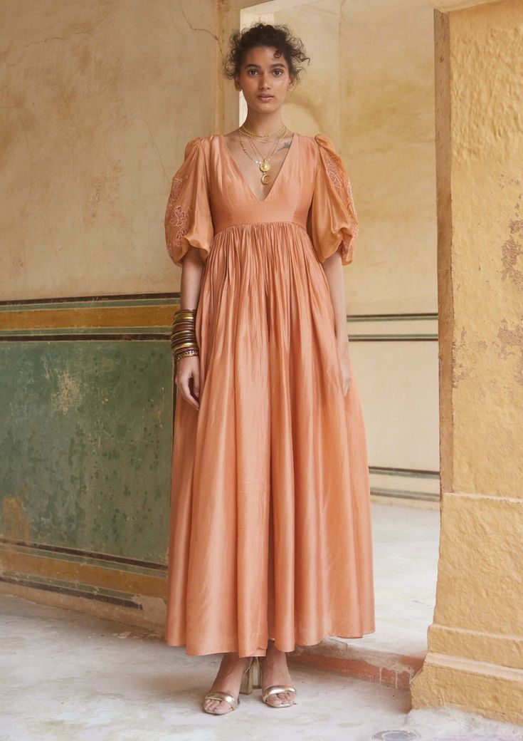 Peachy Orange Maxi Dress by Paulmi & Harsh available on Indiaspopup.com Embroidery Outfits Fashion, Chic Pink Outfits, Flowy Organza Maxi Dress, Spring Floor-length Gown For Occasion Wear, Summer V-neck Gown For Wedding Guest, Elegant Dress With Sheer Sleeves And Loose Fit, Elegant Dress With Sheer Sleeves And Voluminous Fit, Elegant Voluminous V-neck Dress, Summer Bohemian Organza Dress