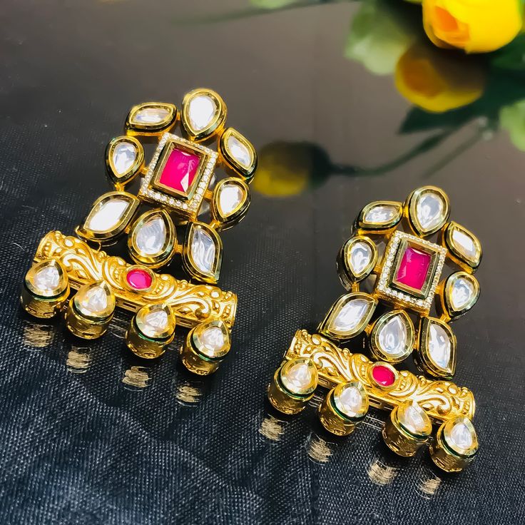 These are a beautiful pair of Earrings, made with beautifully Kundan beaded. These earrings work well with all types of clothing, whether it be formal attire or a casual party. Option 1 : Red Color (E716) Option 2 : Green Color (E717) Eye-catching and unique jewellery that will set you apart. Gift this piece to a loved one, and see their face light up with joy. Best for gifting or for personal use, wear it to any occasion and be in the spotlight. Chandbali Plug Earrings For Party, Party Chandbali Plug Earrings, Pink Elegant Beaded Earrings For Celebration, Elegant Pink Beaded Earrings For Celebration, Festive Jeweled Bridal Earrings For Formal Occasions, Elegant Chandbali Crystal Earrings For Party, Traditional Jeweled Pearl Earrings For Party, Elegant Beaded Pearl Earrings For Festive Occasions, Festive Beaded Drop Earrings For Celebration