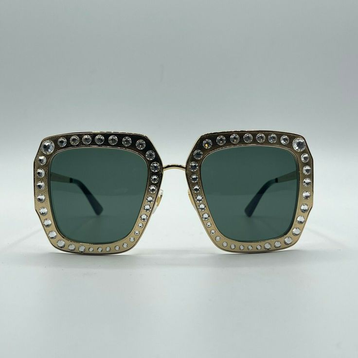 AUTHENTIC BRAND NEW GUCCI SUNGLASSES MADE IN ITALY Measurements (approximate): 52mm x 26mm x 140mm Features: Comes with velvet case Made in Italy Please keep in mind that measurements are provided only as a guide and are approximate.  Sizes listed are based on the item label. Item fit and sizing can vary by Manufacturer. Color appearance may vary depending on your monitor settings. Payment: International buyers are welcome! (Please Note: Import duties, taxes and charges are not included in the i Gucci Square Frame Cat Eye Sunglasses With Tinted Lenses, Gucci Sunglasses With Tinted Lenses And Square Frame, Gucci Gold Sunglasses With Glass Lenses, Vintage Gucci Tinted Sunglasses, Gucci Gold Tinted Sunglasses, White Crystals, Gucci Sunglasses, Square Sunglasses, White Frame