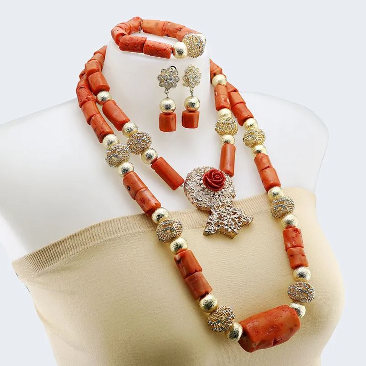 Elevate your bridal look with this stunning wedding necklace African Wedding Jewelry, Coral Jewelry Set, Orange Necklace, Bridal Accessories Jewelry, Crystal Clutch, Necklace Sets, Jewelry Tags, Cubic Zirconia Jewelry, Natural Coral