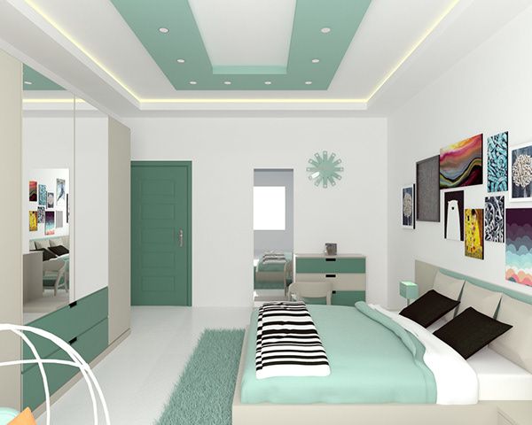 a modern bedroom with green and white decor