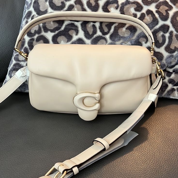 Coach Pillow Tabby 26 Nwt Ivory Designer Cream Shoulder Bag With Top Handle, Designer Cream Top Handle Shoulder Bag, Designer Cream Shoulder Bag With Detachable Strap, Designer Cream Bag With Detachable Strap, Designer Cream Crossbody Shoulder Bag, Designer Rectangular Cream Shoulder Bag, Designer Cream Shoulder Bag With Adjustable Strap, Coach Cream Shoulder Bag For Daily Use, Designer Cream Rectangular Shoulder Bag