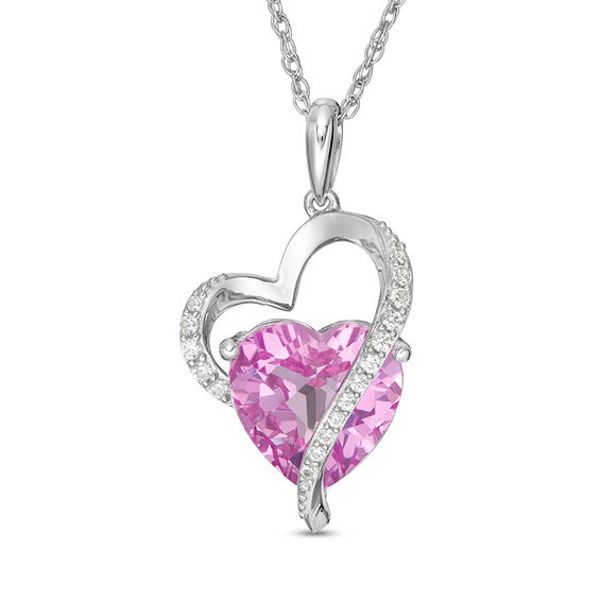 Elegant and charming, this heart pendant takes her look to the next level. Crafted in sterling silver, this spectacular style showcases a 10.0mm heart-shaped lab-created bright pink sapphire artfully layered with a tilted lab-created white sapphire-adorned heart outline. Buffed to a brilliant luster, this pendant suspends along an 18.0-inch rope chain that secures with a spring-ring clasp. Disney Necklace, Heart Outline, Sapphire Stone, Sapphire Jewelry, Stone Heart, Pink Stone, White Sapphire, Heart Jewelry, Rope Chain