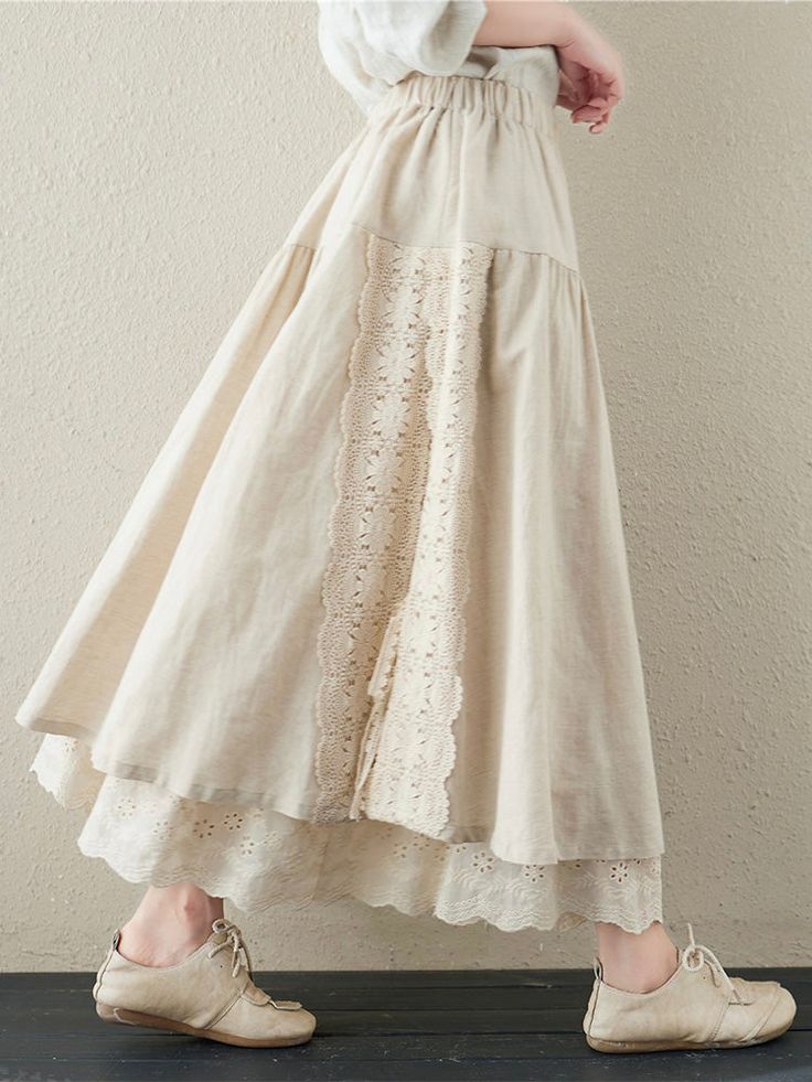 Classic, that's what our two-layer lace skirt is known for. Its neutral and earthy colors are sure to complement any outfit in your aesthetic. It features an A-line shape with an elasticated waist, two layers of beautiful full circle swirls, floral lace embroidery and a side tie fastening. Made from high quality linen Beige Long Skirt With Lace Trim, Beige Cotton Skirt With Lace Trim, Long Cotton Skirt With Embroidered Hem, Cotton Skirt With Embroidered Hem, Cotton Tiered Skirt With Embroidered Hem, Comfy Skirt, Mode Kawaii, Embroidery Skirt, Linen Layers