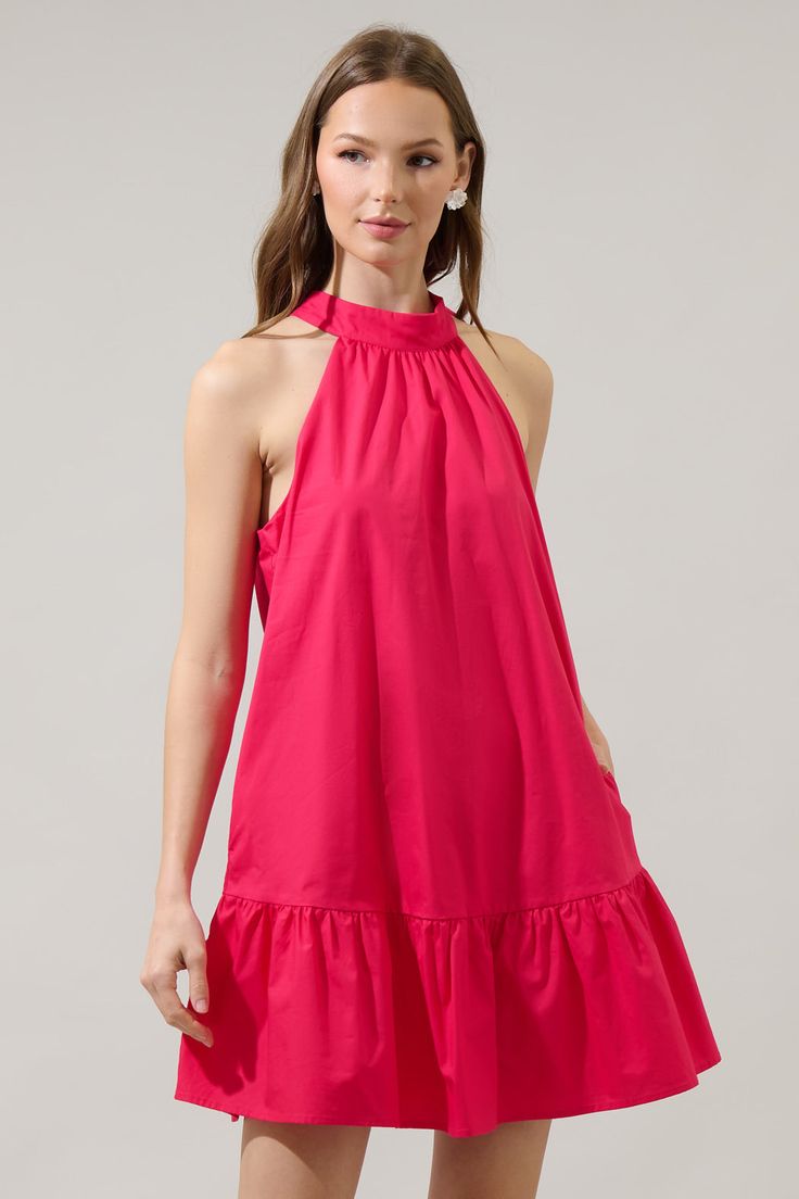 Create a summer look wearing the Gilvana Poplin Laly Mini Ruffle Dress! It features a halter neck with a back tie, no sleeves, and a mini ruffle hem. Add on your favorite sandals and hat to go along this mini dress. - Halter- Back tie neck- Lined- Pockets- Comes in 2 colorsSize + Fit - Model is 5'8" and wearing size XS- Measurements taken from size S - Chest: 19"- Length: 31 1/2" Fabric Self:100%Cotton, Lining:97%Polyester 3%Spandex Style Number STD14089 Sleeveless Ruffled Sundress For Summer Parties, Summer Mini Dress With Gathered Neckline, Summer Vacation Mini Dress With Gathered Neckline, Summer Mini Dress With Gathered Neckline For Day Out, Feminine Halter Neck Dress For Brunch, Pink Ruffled Halter Neck Sundress, Chic Sleeveless Halter Dress With Elastic Neckline, Summer Beach Halter Dress With Gathered Neckline, Summer Halter Neck Dress With Ruffle Hem