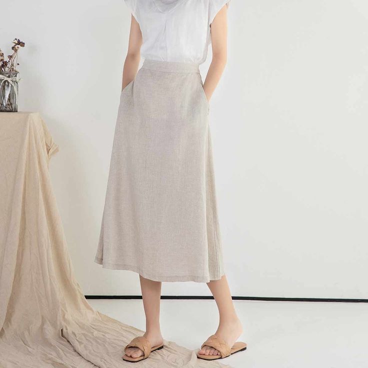 "DETAIL * 100% Linen * Back elastic * Two side pockets * A Line skirt * Below knee length skirt * Wash by hand or machine with cold water * The model is 170cm (5′ 7″) tall with a 66cm (26\") waist. She is wearing a XS/S in natural color. * Choose CUSTOM Order if you Need a better fit Can't find your size in our size Chart Change the Style Chang the Length Your Height is not Between 5'1\" - 5\"9\" SIZING AND FIT, Garment size as follow XS/S Waist 66-71cm Hips 100cm Length 75cm Weight suggest with Long Skirt With Pockets For Spring, Spring Midi Skirt With Pockets, Spring Wide Leg Skirt With Side Pockets, Spring Maxi Skirt With Side Pockets, Wide Leg Skirt With Side Pockets For Spring, Flowy Beige Skirt With Elastic Waistband, Summer Bottoms With Pockets, Midi Length, Beige Flowy Skirt With Elastic Waistband, Beige Midi Skirt With Pockets