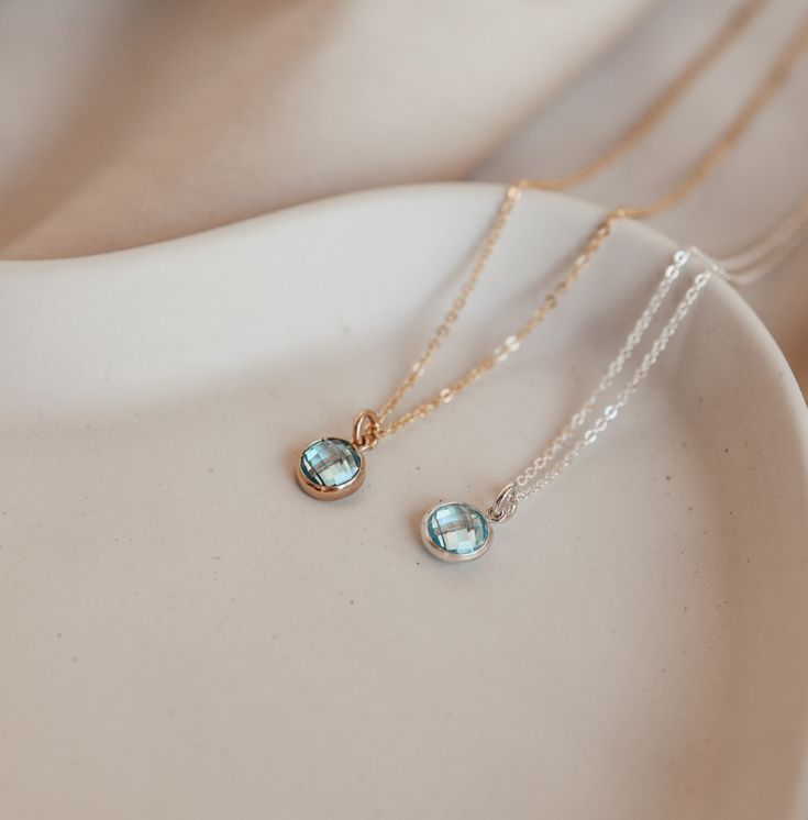 Reminiscent of crystal clear waters this blue CZ stone echoes the March birthstone - aquamarine. Our beautiful drops necklace is crafted for not just for March babes or those with March babes but as a symbol of youth, health and hope. Drops Necklace, Rectangle Necklace, Tiny Pendant, Hope Necklace, Oval Necklace, Symbol Necklace, March Birthstone, Zodiac Necklaces, Crystal Clear Water