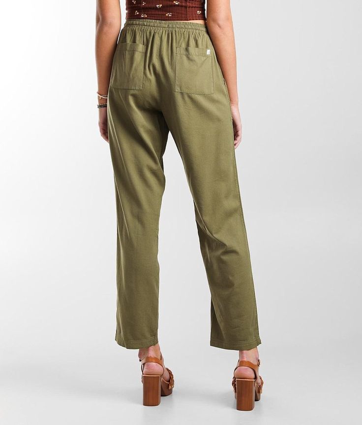 Billabong Beachy Dream Pant - Green Medium, Women's Sage Solid woven pant Rise measures 12 Inseam measures 30 Elasticized cinch tie waistband Shoe sku 963978 Model Info: Height: 5'11 1/2 | Bust: 34 | Waist: 24 | Hip: 35 1/2 | Wearing Size: Medium. 60% Cotton 40% Viscose. Hand wash separately. Do not bleach. Line dry. Cool iron if needed. Do not dry clean.. WOMEN'S BOTTOMS SIZE CONVERSION CHART Waist (size) 22 23 24 25 26 27 28 29 30 31 32 33 34 36 38 Juniors - 00 0 1 3 5 7 9 11 13 15 - - - - US Cotton Cargo Pants For Vacation, Relaxed Fit Tapered Leg Bottoms With Tie Waist, Casual Tapered Leg Pants For Vacation, Summer Tapered Leg Pants With Tie Waist, Casual Cotton Cargo Pants For Vacation, Casual Cargo Pants For Vacation, Casual Bottoms With Paperbag Waist, Summer Cargo Pants With Elastic Waistband For Vacation, Casual Tapered Leg Pants With Tie Waist