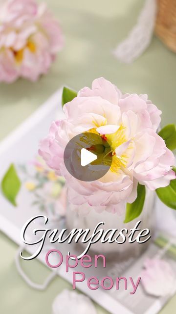 an open peony flower in a vase with the words gumpaste open peony