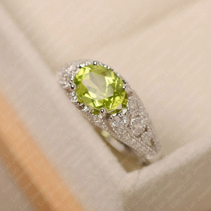 This ring features a 6*8 mm oval cut peridot. Customization is available. It is made by hand, and it will take about 7 days to finish the ring after your payment is completed. Main stone: 6*8 mm oval cut Main stone weight:1.33 ct Metal type: sterling silver /14k gold Accent stone: cz Customization is available, just fee free to contact me, it is free to engrave inside the ring, it is free, you can leave a ntoe with your order, but it will be great no more than 15 letter. Any question, just let m Luo Jewelry, Peridot Engagement Rings, August Birthstone Ring, Original Engagement Rings, Green Gemstone Ring, Oval Cut Ring, Silver Engagement Ring, Emerald Cut Engagement, Engagement Ring For Women