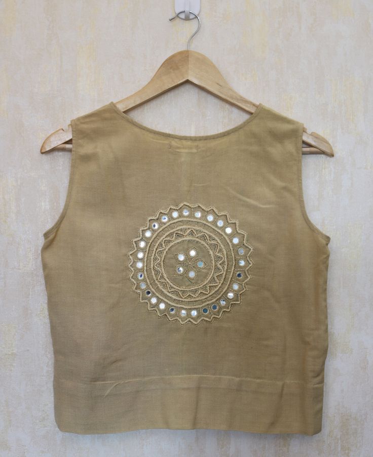 "Sleeveless top for women, Beige linen top, Linen sleeveless top, Linen blouse, Made to order, Custom made, Plus size Hand embroidered linen blouse perfect for a sunny day! Goes best with the trendy linen pants! -Model height: 5'3\" wearing size S -Length: 19.5\" -Fit: Loose -Closure: front hooks The top is hand embroidered with mirror work. This is a one of a kind of hand work called Maggam embroidery. **Note: Free Shipping time 15-21 days. Express Shipping time 5-7 days.**" Bohemian Beige Tank Top, Beige Bohemian Sleeveless Blouse, Beige Cotton Vest Style Top, Beige Cotton Vest Top, Bohemian Linen Sleeveless Tank Top, Bohemian Sleeveless Linen Tank Top, Cotton Tank Blouse For The Beach, Sleeveless Beige Linen Crop Top, Beige Sleeveless Linen Crop Top