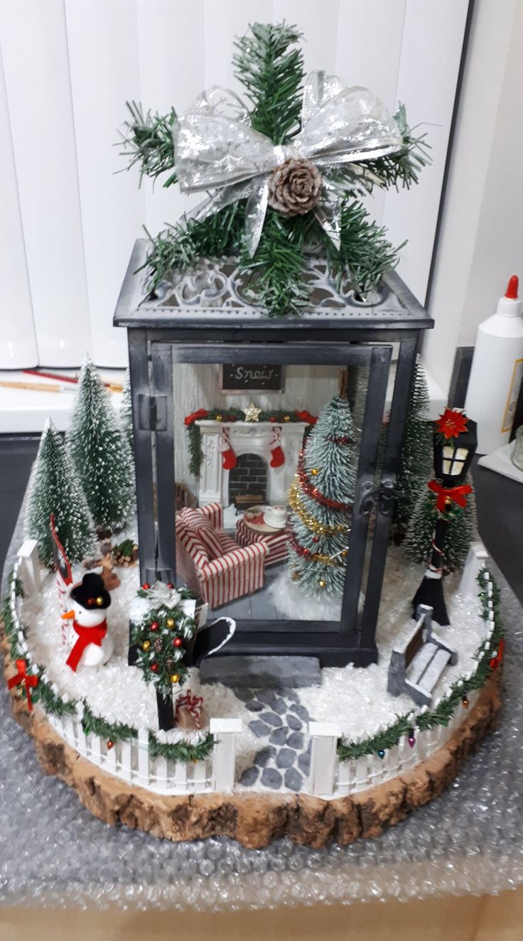 a christmas scene with a clock and decorations