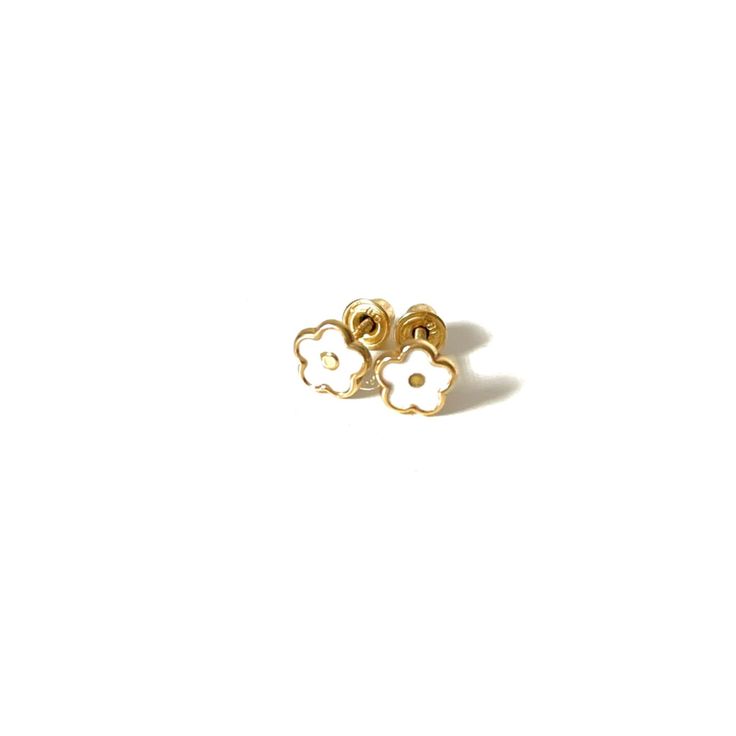 14k gold white stud earrings in the shape of a flower.DETAILS:Diameter: 7mmMaterial: 14k yellow gold base + enamelClosure: Screw Back 14k Gold Earrings With Flower Charm For Gift, Gold Flower Charm Earrings In 14k Gold, Yellow Gold Flower Earrings As Gift, Yellow Gold Flower Earrings For Gift, Yellow Gold Flower Charm Earrings, 14k Gold Flower Earrings For Gift, Fine Jewelry Yellow Gold Flower Earrings, Everyday Yellow Gold Flower-shaped Jewelry, Yellow Gold Flower Jewelry For Everyday