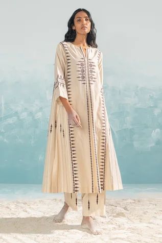 Shop for Ikai Beige Cotton Silk Chanderi Nile Tribal A-line Kurta for Women Online at Aza Fashions Long Kurti Patterns, Kaftan Designs, Kurta For Women, Pant For Women, A Line Kurta, Trendy Fashion Tops, Designs For Dresses, Embroidery Fashion, Indian Designer Wear