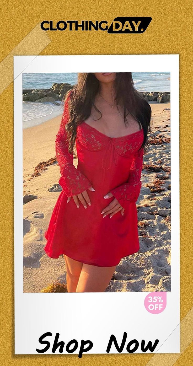 a woman in a red dress is standing on the beach with her hands on her hips