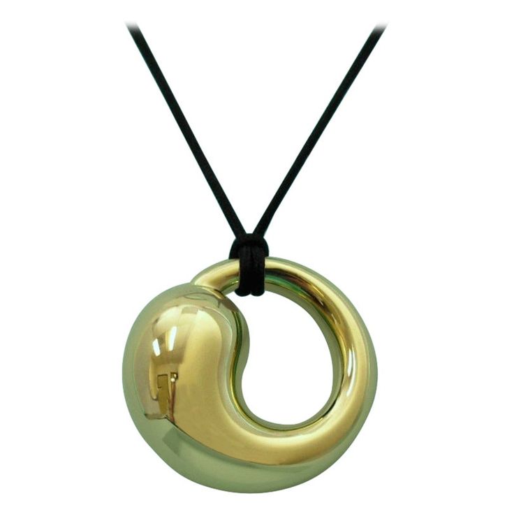 TIFFANY & Co. Elsa Peretti 18K Gold 35mm Eternal Circle Pendant Necklace Extra LARGE Metal: 18K yellow gold Gold weight: 17.10 grams Pendant: 35mm(1.38") wide, Extra-large size Silk Cord: Tiffany 20" black silk cord Hallmark: TIFFANY&Co. ©Elsa Peretti 750 SPAIN Condition: New, comes with Tiffany pouch, box, bag and ribbon bow Limited edition, no longer available for sale in Tiffany stores Authenticity Guaranteed Elsa Peretti, Circle Pendant Necklace, Silk Cord, Tiffany And Co, Box Bag, Ribbon Bow, Circle Pendant, Style Jewelry, Gold Gold