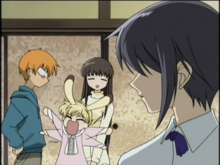 an anime character is talking to two other characters