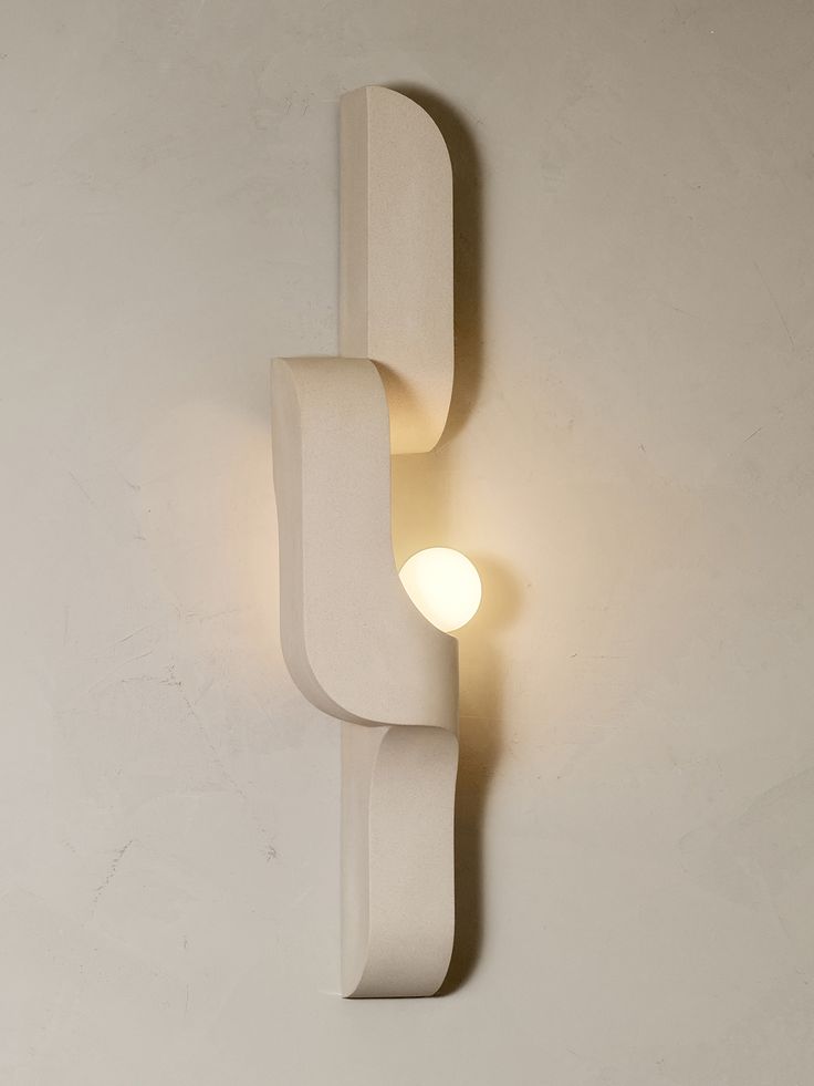 a wall light that is on the side of a wall