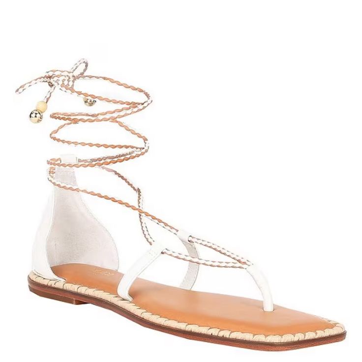 From Antonio Melani X The Nat Note, The Solano Fabric Ankle Wrap Thong Sandals Feature: Fabric Upper Buckle Closure Leather Lining Leather Outsole Approx. 0.5" Heel Height Imported. New Without Box With Store Markings At The Bottom. White Round Toe Lace-up Sandals For Vacation, White Lace-up Sandals With Round Toe For Vacation, White Ankle Strap Lace-up Sandals For Vacation, White Flat Heel Lace-up Sandals For Beach, White Adjustable Ankle Strap Lace-up Sandals, White Lace-up Sandals With Ankle Strap For Vacation, White Lace-up Sandals For Beach, Chic White Lace-up Beach Sandals, White Leather Lace-up Sandals With Round Toe