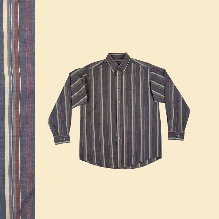 Vintage men's long sleeve striped shirt, manufactured circa 1990s by David Taylor. This button-down shirt features a grey/burgundy/beige striped pattern, lightweight fabric, and a collar. Size M.  - Time Period: c. 1990s  - Brand: David Taylor  - Size: M, long sleeve  - Colors: Burgundy, grey, beige, grey-ish blue & green  - Materials: 65% polyester, 35% cotton  - Made in: China  - Condition: In good, vintage condition w/ some minor pulled threads and some wear/loose threads in the armpits (see close-ups).  Measurements:   - Armpit to armpit: 22.5"  - Shoulder: 18"  - Length: 31"  - Sleeve: 24" Note: our measurements are taken with clothing laid flat. We do not double for circumference on horizontal measurements.  We offer free shipping within the United States for all orders over $35, and Oversized Pinstripe Long Sleeve Shirt, Classic Relaxed Fit Yarn-dyed Shirt, Classic Yarn-dyed Shirt In Relaxed Fit, Relaxed Fit Yarn-dyed Button-up Shirt, Yarn-dyed Long Sleeve Fall Shirt, Yarn-dyed Long Sleeve Shirt For Fall, Classic Long Sleeve Yarn-dyed Shirt, Casual Long Sleeve Shirt With Vertical Stripes, Casual Long Sleeve Yarn-dyed Top