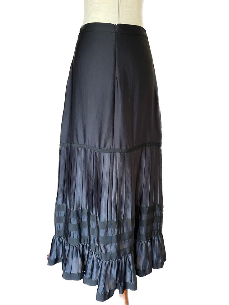 Mercata Imports Mercatina offers this gorgeous GIORGIO ARMANI Black Rayon Tiered Ribboned Ruffle Maxi Skirt Made in Italy Excellent condition, never worn. Size Medium (40 EU) Elegant Full Skirt Bottoms With Ruffles, Elegant Black Bottoms With Ruffle Hem, Spring Black Pleated Skirt With Ruffles, Elegant Black Pleated Skirt With Ruffles, Elegant Black Maxi Skirt With Ruffles, Elegant Black Skirt With Ruffle Hem, Black Flared Maxi Skirt With Ruffles, Elegant Pleated Skirt With Ruffles And Voluminous Fit, Elegant Tiered Skirt With Attached Cancan