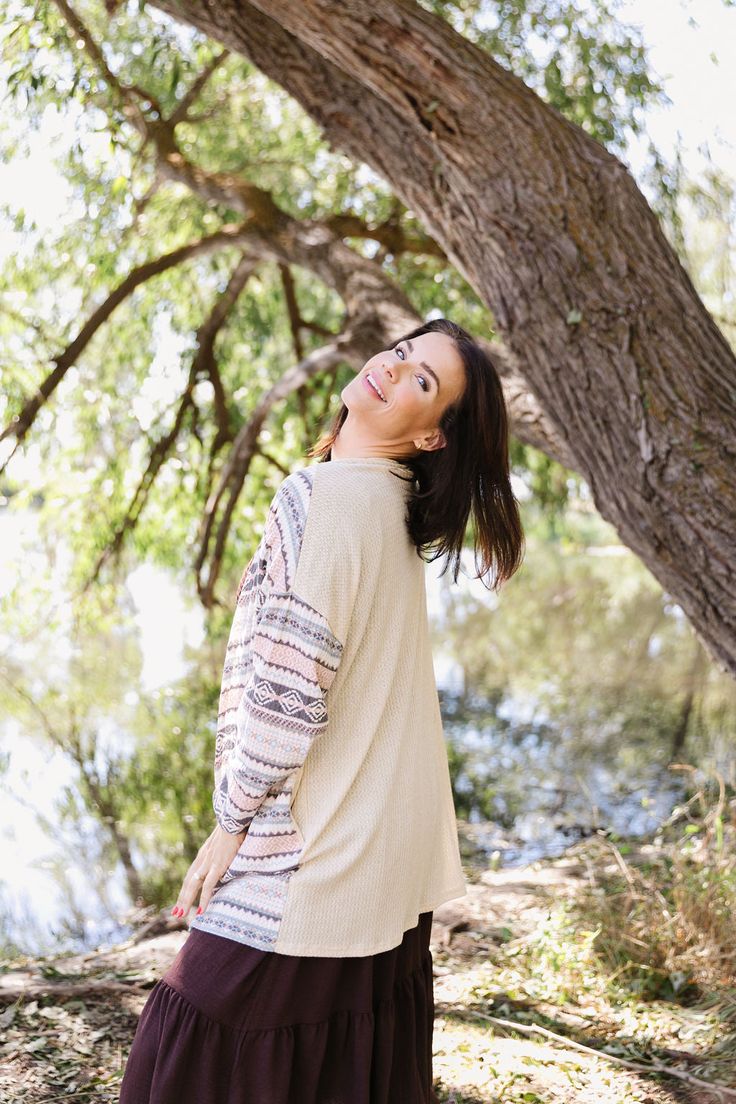 Stay cozy and stylish with our Brielle Cardigan. Its cream color and Aztec print will add a touch of happiness to your wardrobe. Made with a soft waffle knit, this cardigan will keep you warm and comfortable, whether you're out on the town or relaxing at home. Fits true to size. Model is wearing medium and is 5'8". Plus model is wearing 2X and is 5'7". Size Chart Length Bust S 30" 44" M 31" 48" L 31" 50" 1x 31" 52" 2x 32" 54" 3x 34" 56" *All measurements are approximate and done while hanging. B Beige Waffle Knit Long Sleeve Sweater, Beige Waffle Knit Sweater For Spring, Cozy Cream Long Sleeve Cardigan, Cozy Long Sleeve Cream Cardigan, Beige Long Sleeve Sweater For Day Out, Cream Soft Knit Sweater For Day Out, Cozy Jacquard Knit Cardigan, Cozy Beige Sweater For Day Out, Casual Beige Jacquard Knit Cardigan