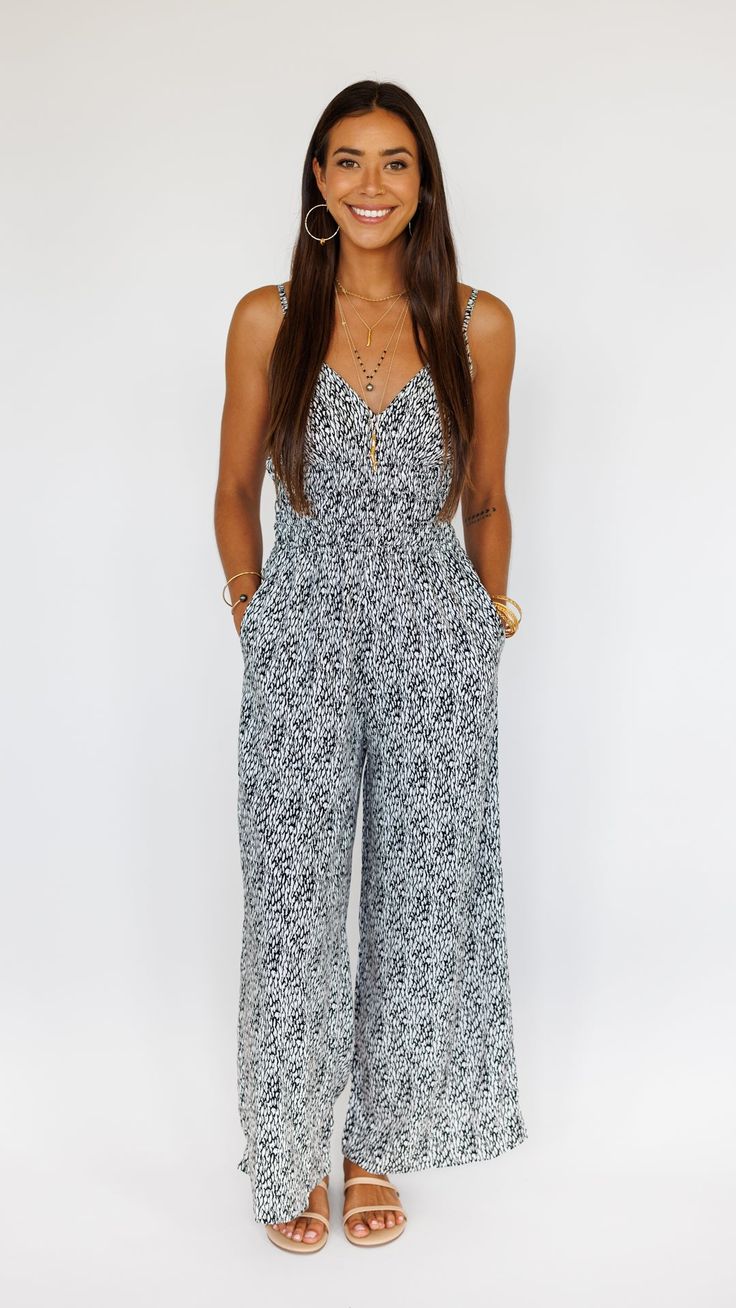 Stand out in this stunning jumpsuit, made to flow with buttery soft rayon and an exaggerated wide pant leg. Features adjustable straps and a gentle smocked waist to flatter. ** Our Model is 5'8" and wearing a size SMALL. ** Fabric and Care Instructions: *100% Rayon *Hand wash cold * Line Dry Retail Boutique, Casual Jewelry, Signature Jewelry, Wide Pants, Care Instructions, Adjustable Straps, Opal, Jumpsuit, Hand Wash