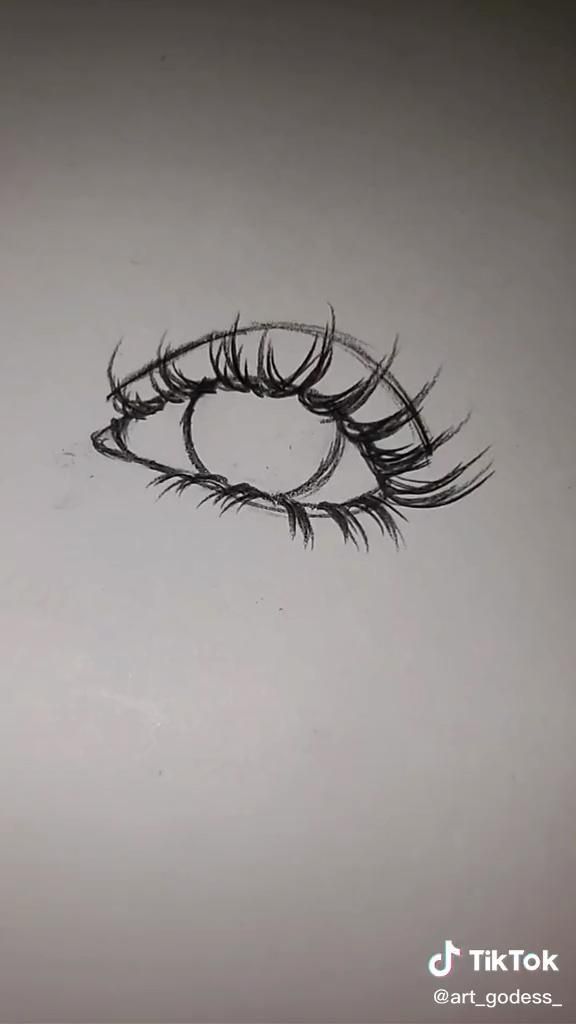 a drawing of an eye with long lashes