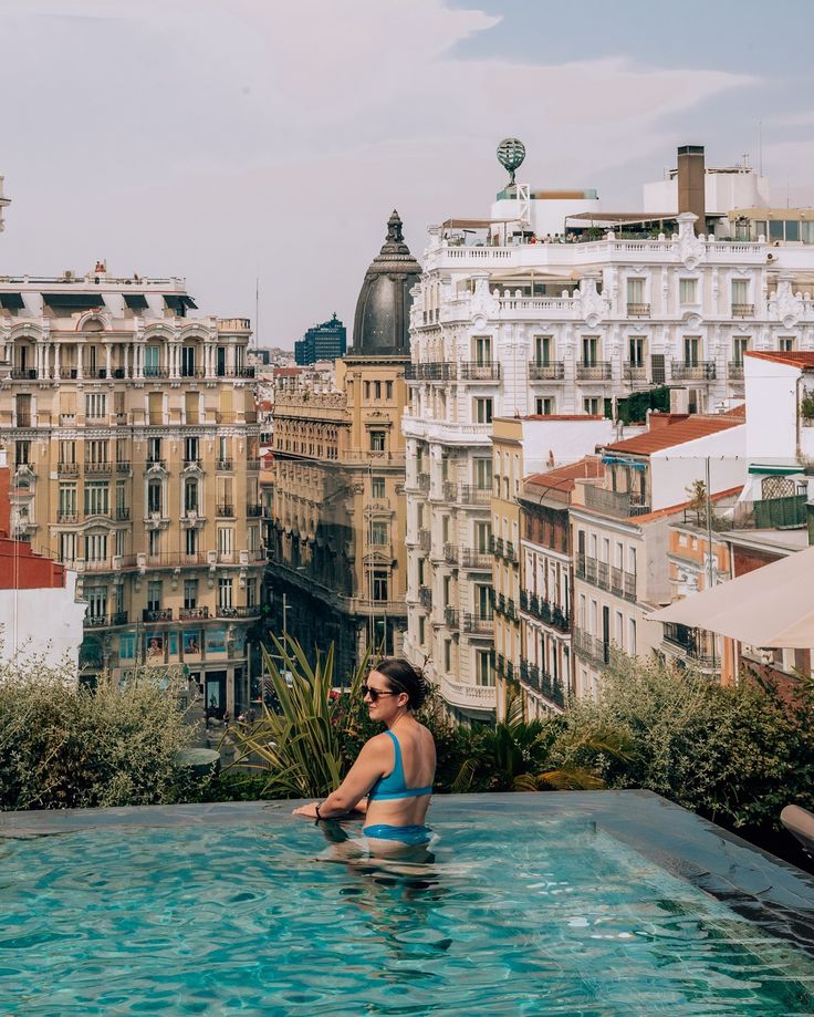 The Best Rooftop Pool in Madrid 📍Thompson Hotel It gets HOT in the summer in Madrid and having a nice pool to cool off midday was essential for us ☀️ The pool was bigger than most other rooftop pools I’ve seen, the wine was great, and the views were incredible 🌆 If you’re planning a trip to Madrid, definitely save this! #madrid #madridspain #spain #travelspain #travelmadrid #visitspain #visitmadrid #thompsonhyatt #hyatt #besthotelmadrid #rooftoppool #europe #europeansummer #westerneurope Summer In Madrid, Rooftop Pools, Thompson Hotel, Visit Madrid, Rooftop Pool, Planning A Trip, Western Europe, European Summer, Bath House