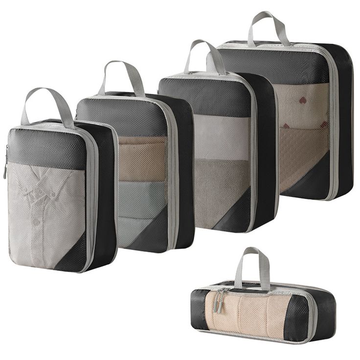 four pieces of luggage sitting next to each other on a white background with one bag in the middle