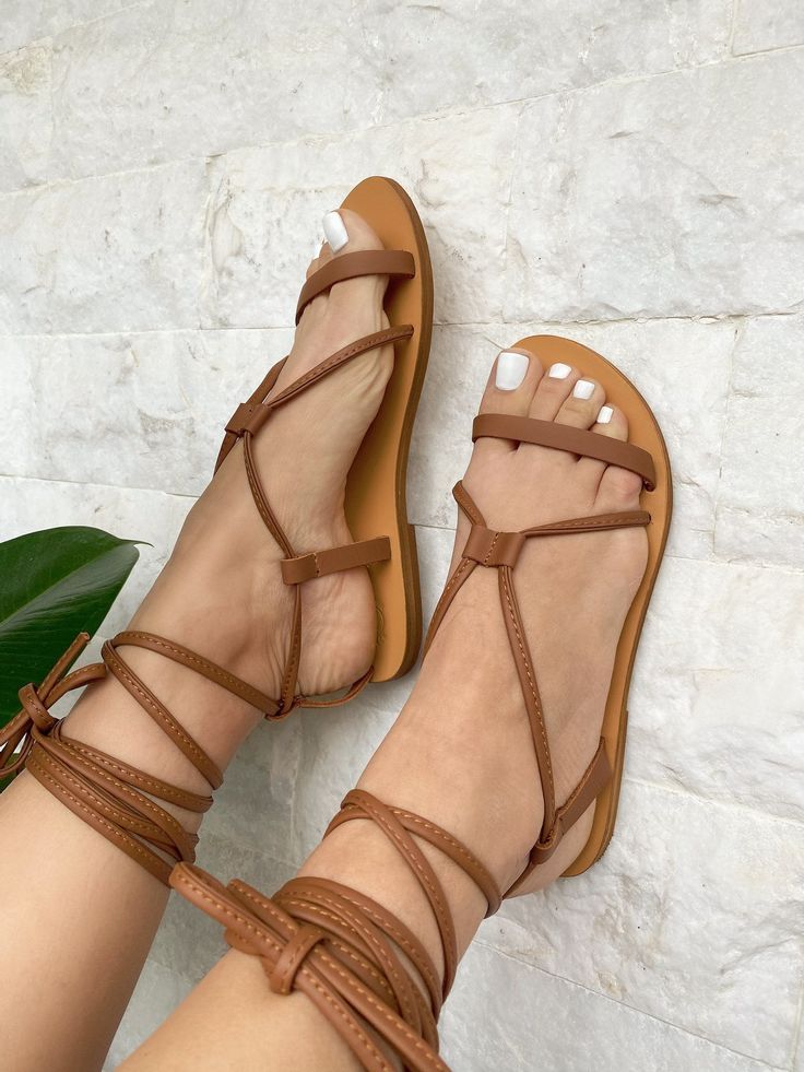 A handmade pair of Women Gladiator Sandals that are made from full grain leather in brown color. You can wrap - tight them until your knees, or lower at your ankles. In Christina Christi Jewels store you can see more than 50 designs in Women's Leather Sandals. You can have them in 2-4 Days with DHL EXPRESS SHIPPING MATERIALS - 100% Greek Leather - 100% Handmade Sandals - The sole is lightweight and handmade with of high-durability rubber. You can enjoy miles of safety walk and sandal's soles wil Brown Closed Toe Leather Lace-up Sandals, Brown Leather Lace-up Sandals With Leather Footbed, Brown Leather Ankle Strap Lace-up Sandals, Brown T-strap Sandals With Adjustable Strap For Vacation, Brown Strappy Lace-up Sandals, Brown Ankle Strap Huarache Sandals With Leather Footbed, Brown Leather Lace-up Sandals For Beach, Brown Strappy Toe Ring Sandals For Vacation, Leather Lace-up Sandals With Adjustable Strap For Vacation