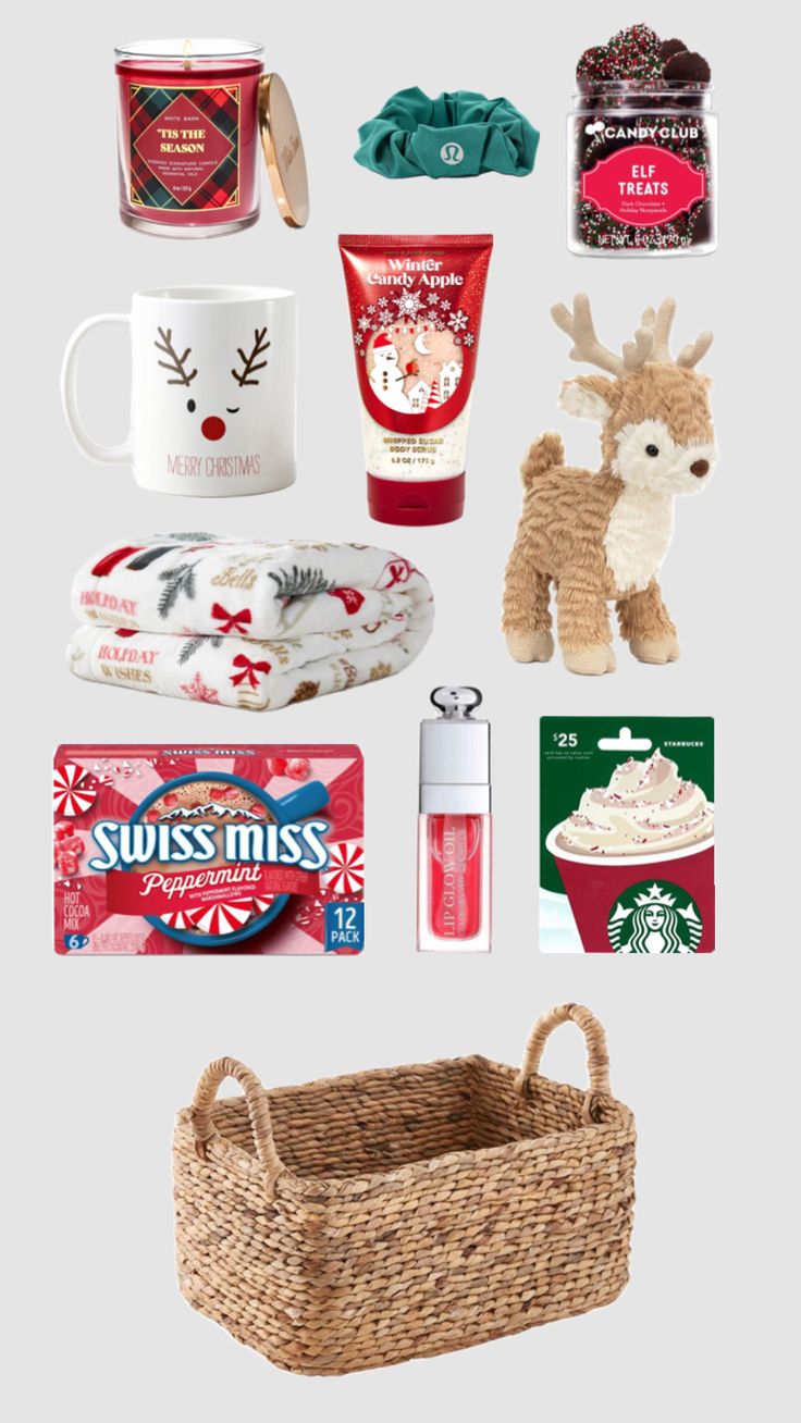 various items are arranged in the shape of a basket and include coffee mugs, cookies, marshmallows, hot cocoa