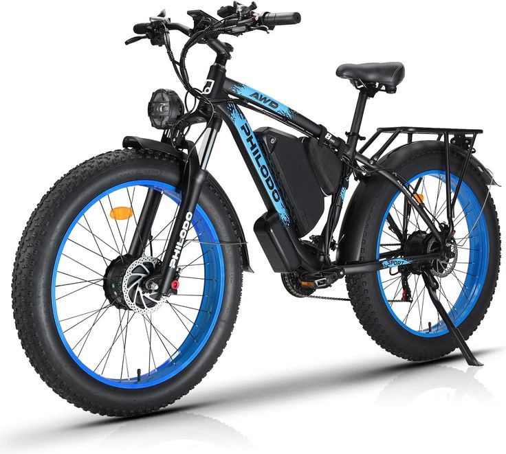 an electric bike with blue spokes on the front and back wheels, parked against a white background