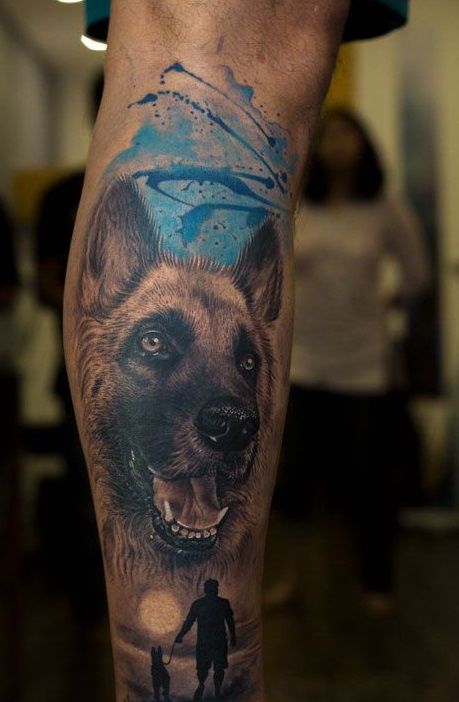 a man's leg with a tattoo on it and an image of a dog