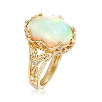 Ross-Simons - Ethiopian Opal, .28ct t. w. Diamond Ring Oval Cut in 14kt Yellow Gold. Size 7. Feast your eyes on this unique ring! A smooth 12x16mm oval cabochon of Ethiopian opal looks luminous in polished 14kt yellow gold. The fancy setting sparkles with .28 ct. t. w. round brilliant-cut diamonds, further adding to the beauty of the piece. 3/4" wide. Diamond and Ethiopian opal ring. Opal birthstones are the perfect gift for October birthdays. Diamond Ring Oval, October Birthdays, Unique Opal, Opal Birthstone, Opal Wedding Rings, Ethiopian Opal Ring, Gold Necklace Simple, Ring Opal, Precious Gemstones Jewelry