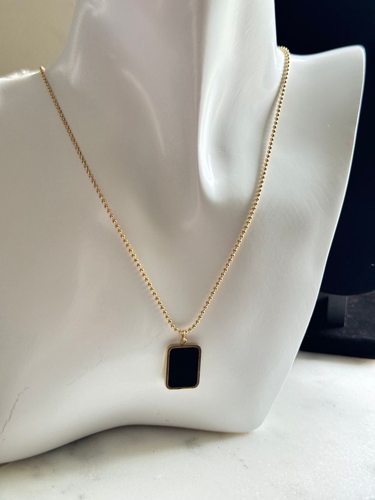 This necklace will capture the essence of refined beauty. ✨ Timeless Pendant Chain Necklace For Gift, Timeless Pendant Chain Necklace As A Gift, Elegant Gold Charm Necklace With Rectangular Pendant, Elegant Necklace With Box Chain And Rectangular Pendant, Elegant Necklace With Rectangular Pendant And Box Chain, Classic Formal Necklaces With Rectangular Pendant, Classic Formal Necklace With Rectangular Pendant, Classic Necklaces With Adjustable Chain And Rectangular Pendant, Gold Chain Necklace With Rectangular Pendant