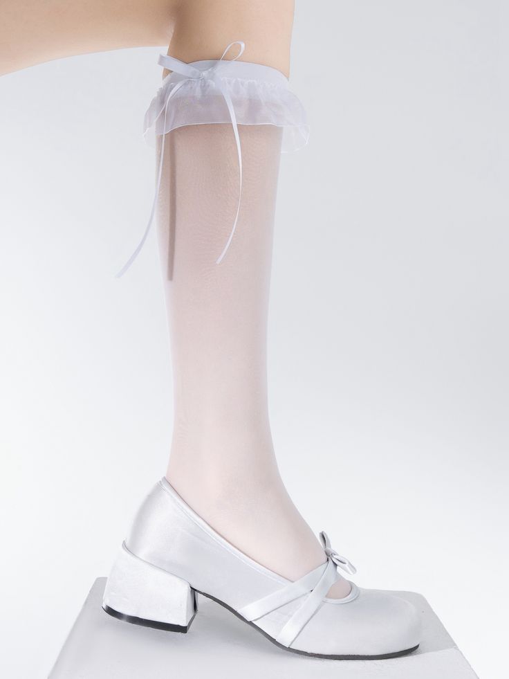 Add a touch of sweetness to your summer outfit with these semi-sheer bowknot stockings. Available in both white and black, these delicate stockings are perfect for adding a charming and kawaii touch to your look.  Each package includes a pair of these adorable socks, making them the perfect accessory for any summer ensemble. White Party Stockings For Spring, Fitted Bow Stockings For Party, White Hosiery For Spring Party, White Hosiery For Party In Spring, White Party Hosiery For Spring, Thigh High Party Hosiery With Bow, Thigh High Bow Legwear For Party, White Knee-high Party Legwear, Thigh-high Bow Legwear For Party