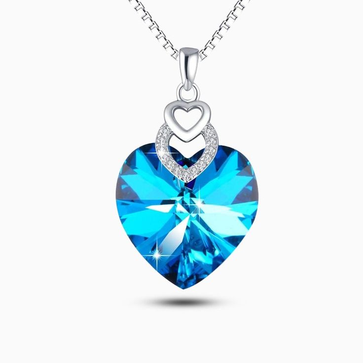 An explosion of beautiful colors, our Heart of the Ocean is crafted in 925 Sterling Silver that features a gorgeously crafted heart stone pendant. Exclusively available in silver. This bright sparkling necklace adds some “wow factor” to your wardrobe! Premium Materials - Made from authentic gemstones & nickel-free metal Elegant Blue Necklace With Heart Charm, Elegant Blue Necklaces With Heart Charm, Sapphire Jewelry For Valentine's Day, Sterling Silver Crystal Necklace With Heart Charm, Cubic Zirconia Gemstone Heart Pendant Necklace, Sterling Silver Pendant Crystal Necklace For Her, Blue Gemstone Heart Cut Necklace, Sapphire Heart Pendant With Heart Charm, Blue Heart-cut Necklaces With Heart Charm