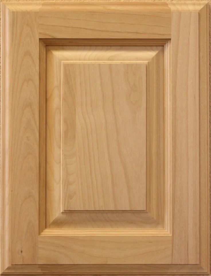 an unfinished cabinet door with wood grained edges