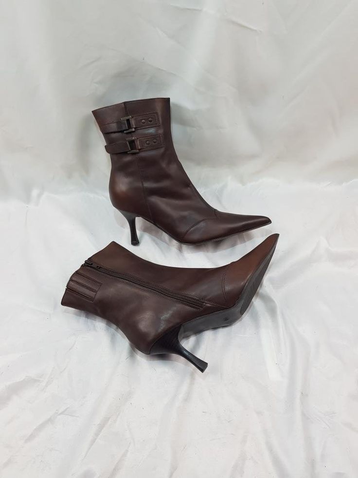 I present to your attention unique vintage brown stiletto heel dress boots with a tointed toe made of genuine leather. These women's 90s-style zip-up boots are comfortable and practical. The soft leather made these boots very comfortable. These vintage retro style ankle boots with a high heel are made for special women. Be the center of attention with confidence: these boots are guaranteed to turn heads and spark conversations. A classic style that never goes out of style, offering you an iconic Ankle Boots Vintage, Fitted Mid-calf Boots With Round Toe For Fall, Vintage Winter Boots In Faux Leather, Vintage Faux Leather Boots For Fall, Vintage Faux Leather Winter Boots, Fitted Ankle-high Platform Boots For Fall, Brown Platform Boots With Pointed Toe And Reinforced Heel, Brown Platform Boots With Reinforced Heel And Pointed Toe, Brown Pointed Toe Platform Boots With Reinforced Heel