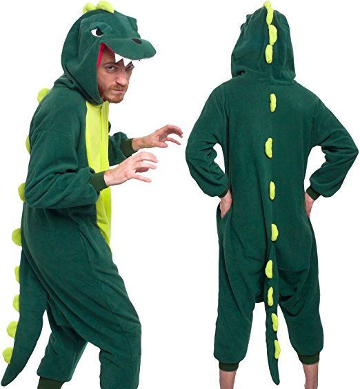 a man in a green dinosaur costume pointing at something